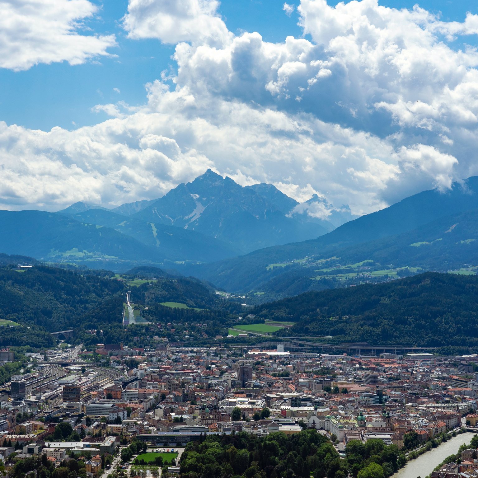 Your hotel in Neustift in Stubaital City with mountains under cloudy sky
