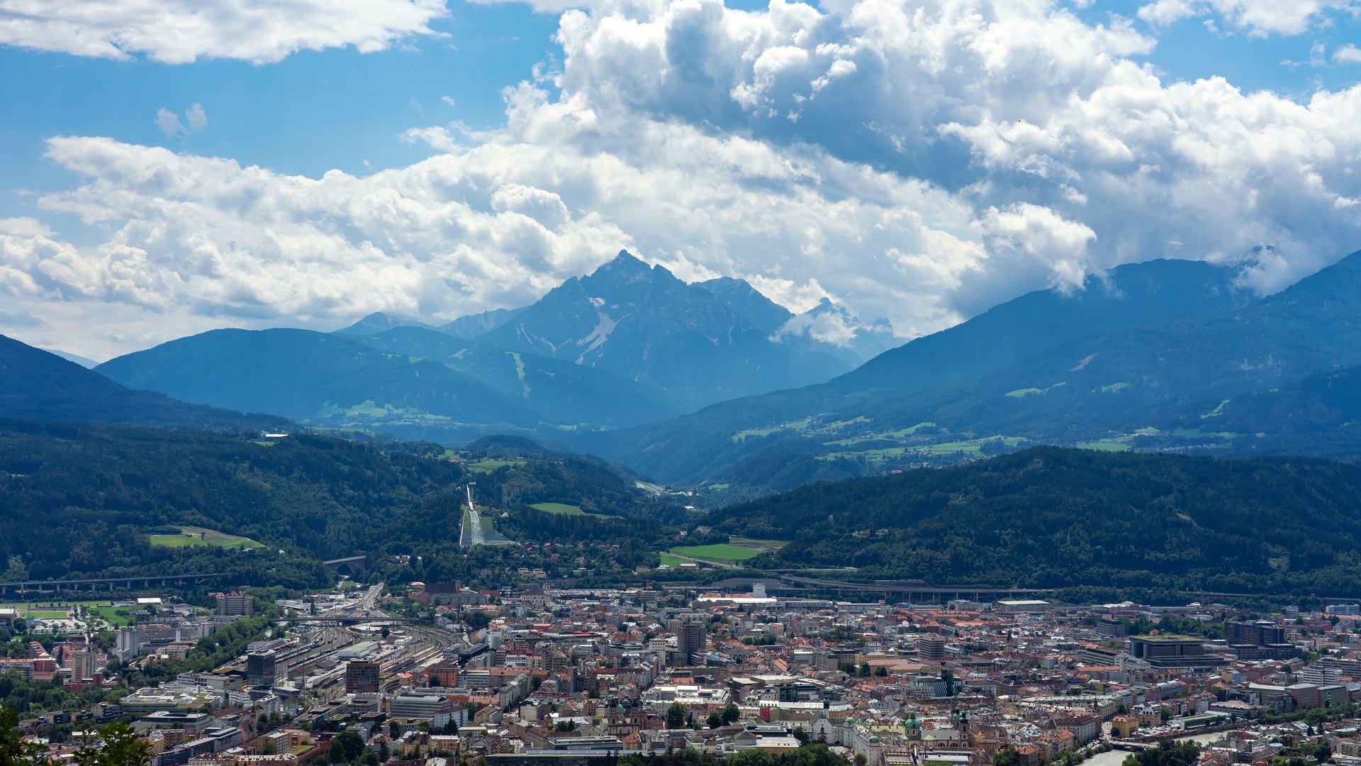 Things to do in Stubaital City with mountains under cloudy sky
